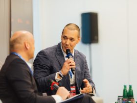 Panel discussion at Prague Gaming & TECH Summit 2024, featuring industry leaders in gaming, technology, and innovation, set against the backdrop of vibrant Prague.