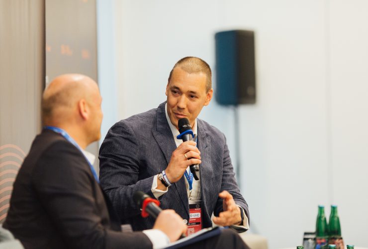 Panel discussion at Prague Gaming & TECH Summit 2024, featuring industry leaders in gaming, technology, and innovation, set against the backdrop of vibrant Prague.