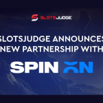 slotsjudge-announces-strategic-partnership-with-spinon